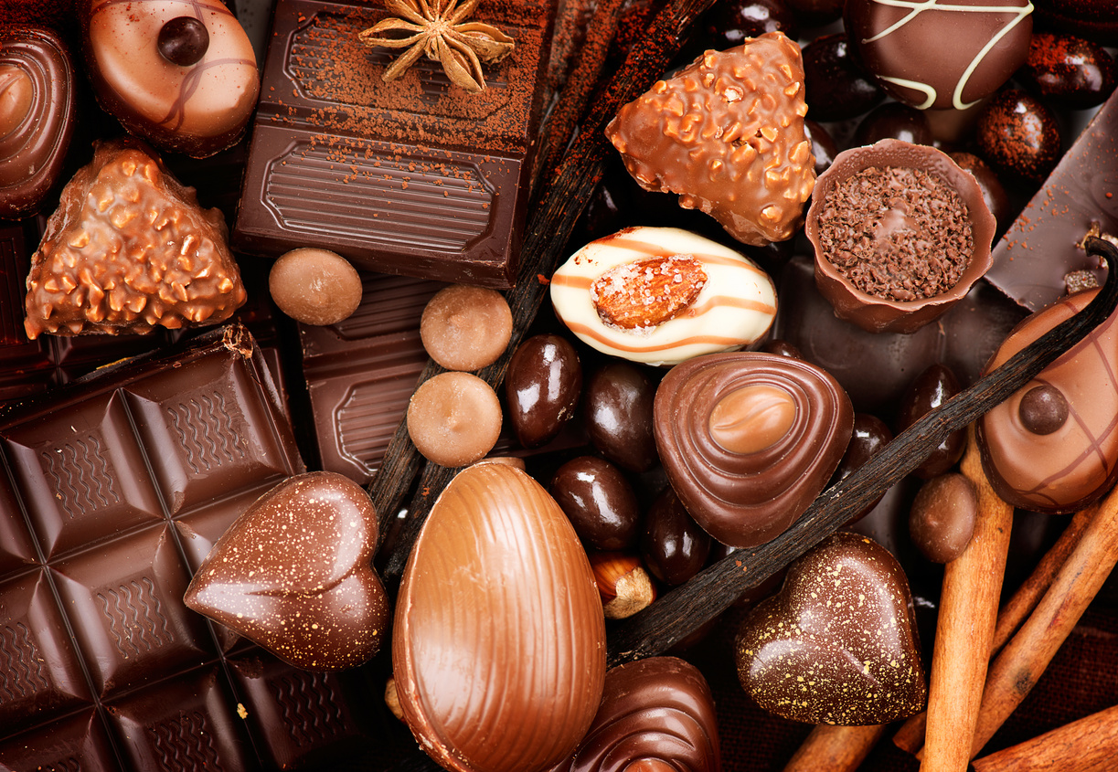 Chocolates Background. Praline Chocolate Sweets